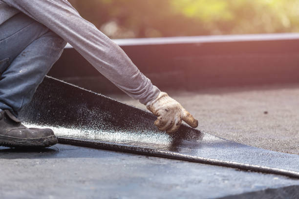 Professional Basement Waterproofing technician working in Delevan, NY